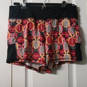 Zelos running athletic shorts orange pink black white print Sz M  EUC